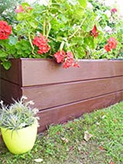 Paint a raised garden bed.