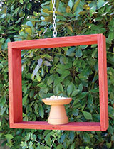 Wooden hanging bird feeder