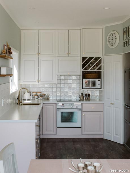A kitchen painted in pastel hues
