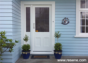 A blue exterior of Resene Comfort Zone with white trims