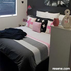 Dark feature wall in bedroom