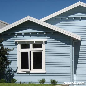 Blue and white bungalow exterior