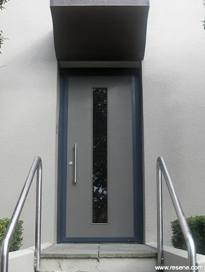 Grey apartment building entryway