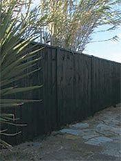 Stain a garden fence