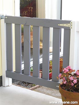 Build a wooden gate and paint it.