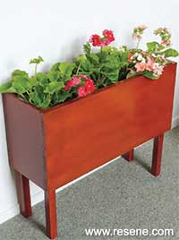 How to onstruct a stylish indoor plant stand using some old wooden cupboard doors 