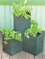 Build stackable planter boxes from reclaimed timber, ideal for your herbs