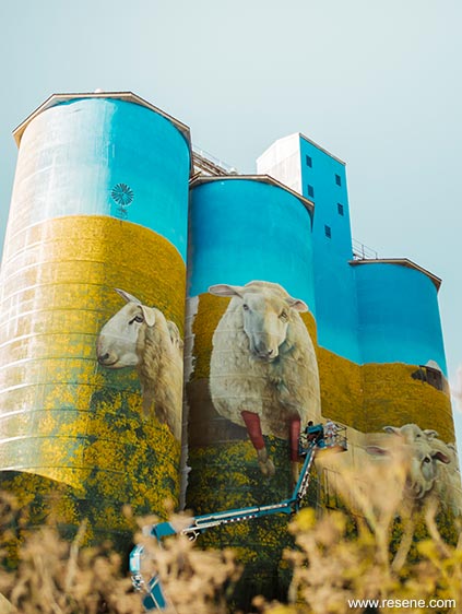 Sheep painted on the side of silo