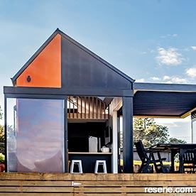 Wahi tiny house with roof linking living areas