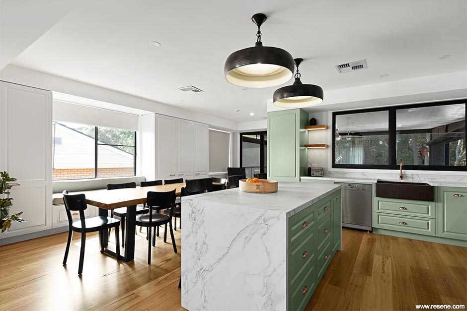 A green and white kitchen
