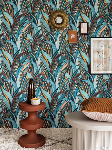 A graphic wallpaper pattern featuring teal leaves - 541250