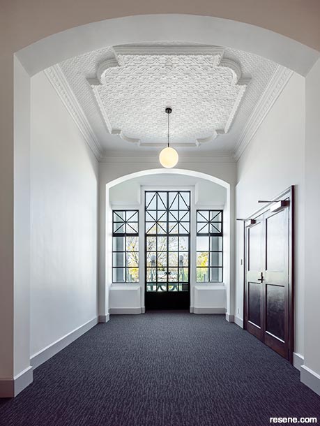 Pressed metal ceiling and cornices