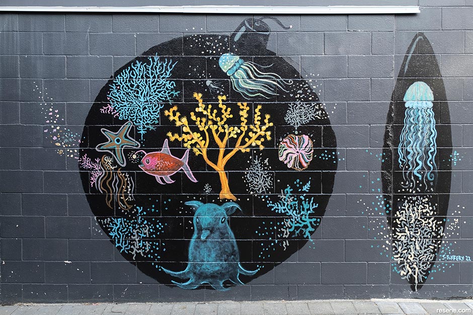 Artist Sheyne Tuffery collaborated on the expansive Wellington mural