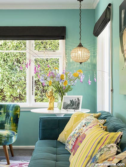 Turquoise lounge walls makes a statement