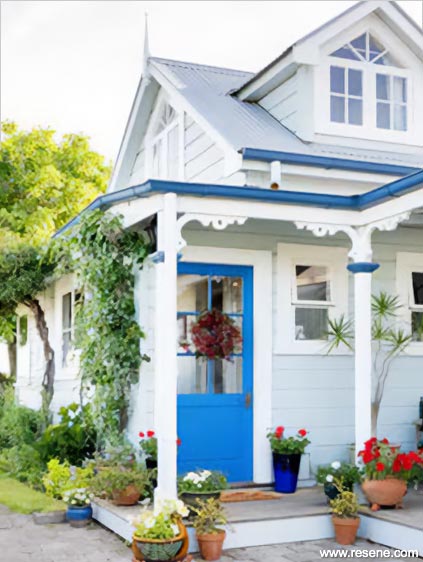 Blue and white colonial styled house