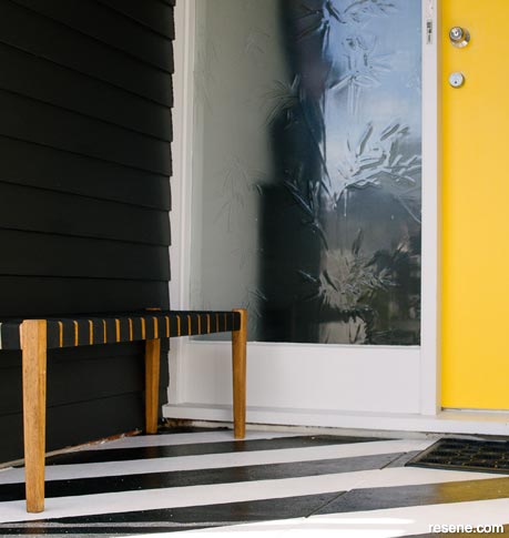 A painted striped floor in Resene White and Resene All Black
