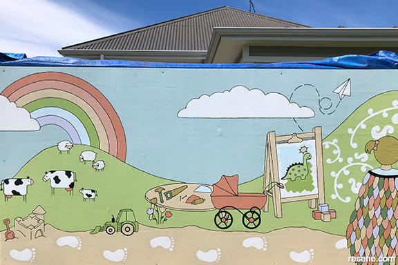 Mural theme - memories from our tamariki, past and present.