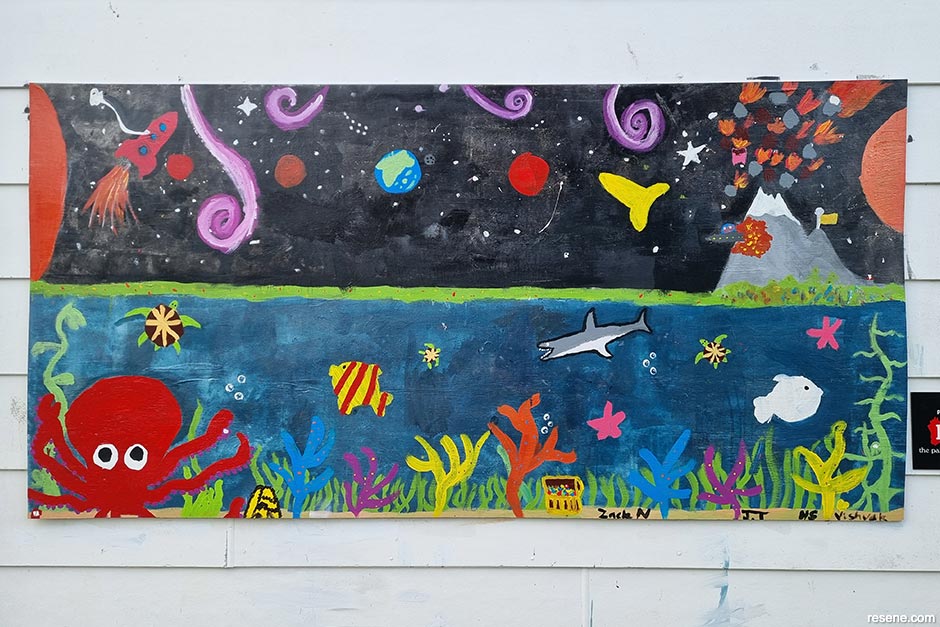 A space and sea themed mural