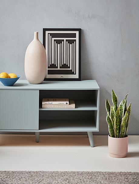A contemporary mid-mod style sideboard