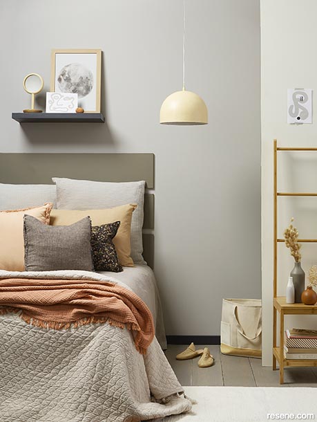 Bringing apricot accessories into a neutral bedroom
