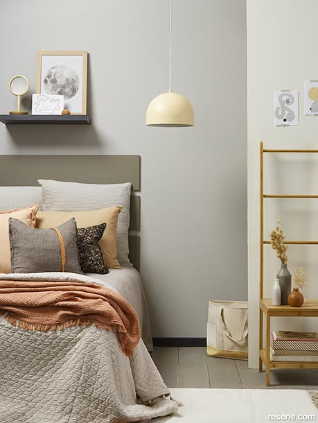 A neutral bedroom with hints of apricot and dusty pinks