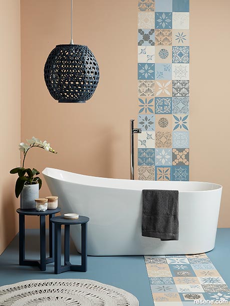 Bathroom painted in blue and blush colours