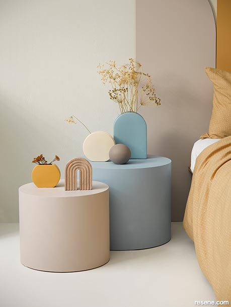 Paint bedside tables in soft soothing hues