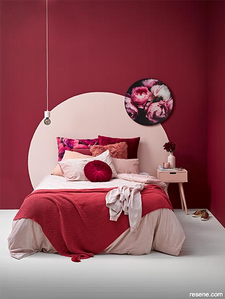 A red maximalist bedroom