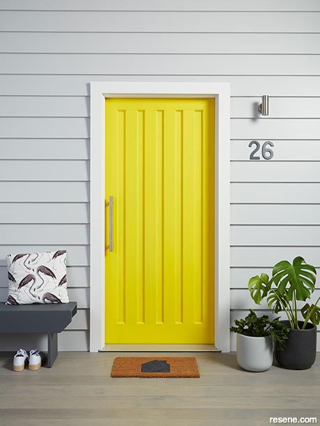 A bright yellow front door