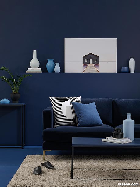 A sophisticated living room with layered shades of blue
