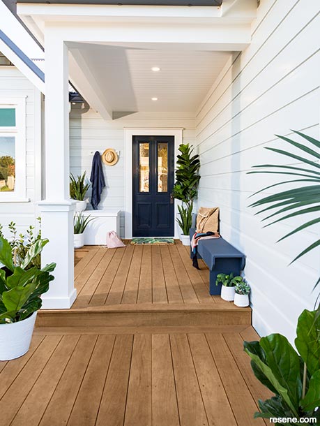 A Hamptons-style front entranceway and porch