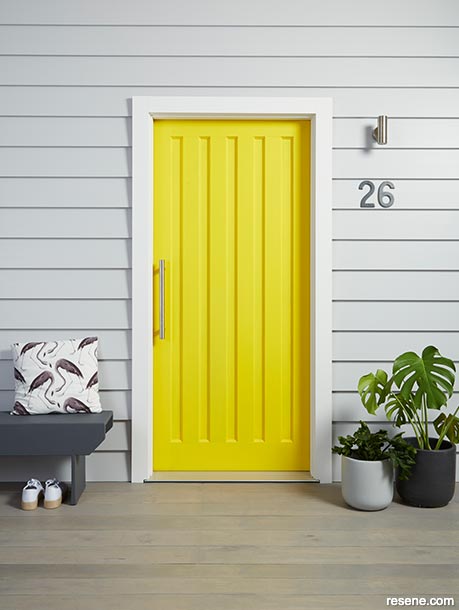 An eye catching yellow front door