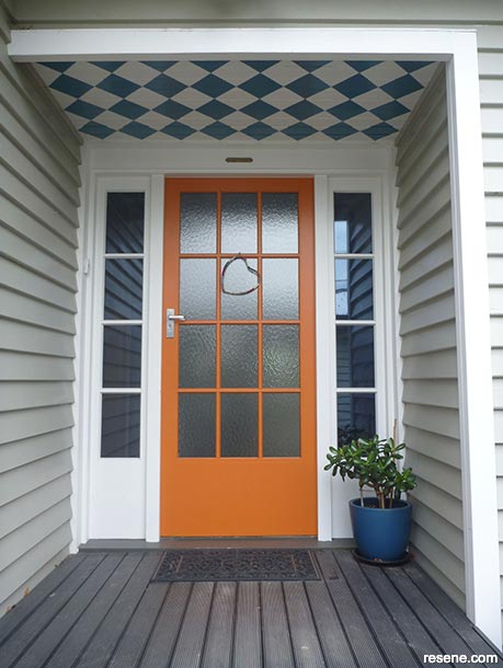 A striking orange front door