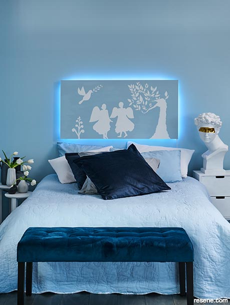 A blue and white regal bedroom