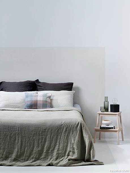 A white-on-white minimalist bedroom