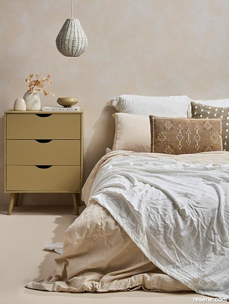A bedroom painted with earthy neutrals