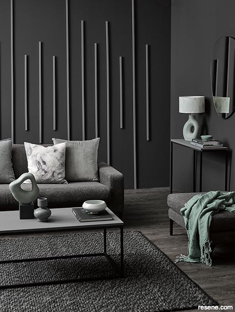 A cosy interior painted with dark colours