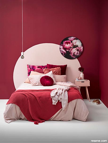 A wine red and pale pink bedroom