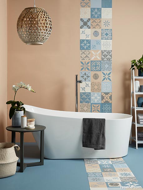 Stencilled tiles can add visual interest to a bathroom