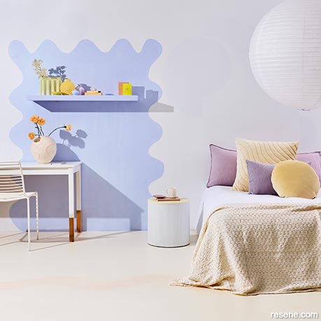 A bedroom painted in candy-coloured pastels