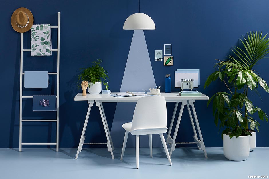 A blue home office with a quirky feature