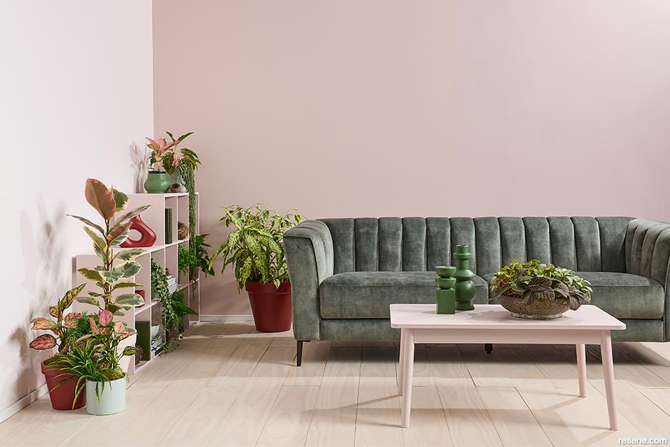 Raspberry tones feature in a more brick-coloured theme in this lounge