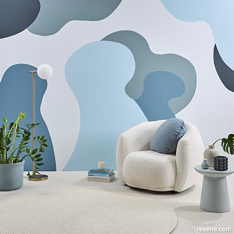 A dramatic mural with organic curved shapes