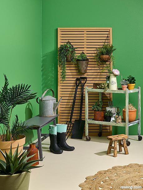 A bright green hobby shed