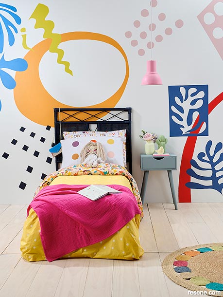 A colourful kids bedroom with stencilled patterns