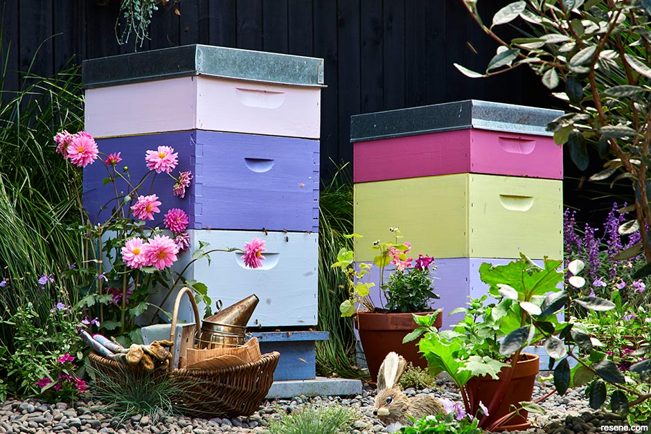 Painted beehives for your garden - pastel hues
