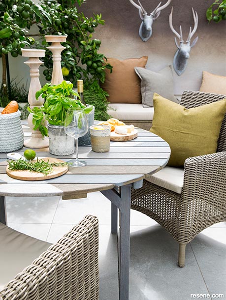 An outdoor dining space with classic good looks