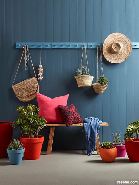 A blue outdoor feature wall