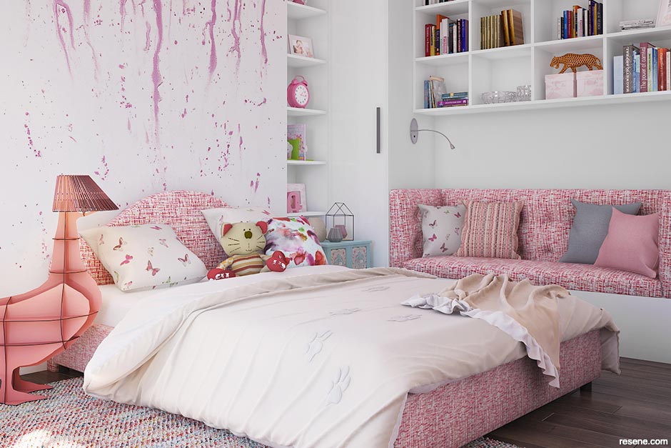A child's bedroom with a watercolour mural on feature wall