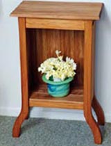 Paint a wooden cabinet with teak oil.